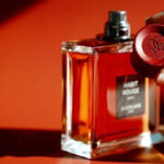 Quadpack створює розкішну дерев'яну кришку для парфумів Guerlain Habit Rouge…