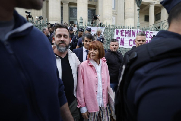 Gisele Pelicot (C) accompanied by her son Florian Pelicot (L) leaves the Gard criminal court, in Nimes, France, on Thursday. Photo by Guillaume Horcajuelo/EPA