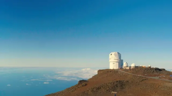 At the top of the mountain above the clouds is the Inouye Solar Telescope - the world's most powerful instrument for observing the Sun.